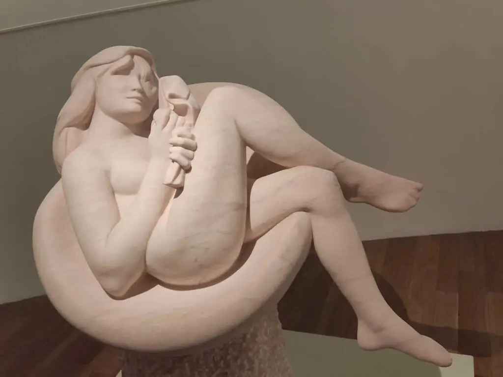 thebes seated in an armchair